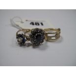 A 9ct Gold Sapphire Set Cluster Ring, of flowerhead design; a 9ct gold cluster dress ring and