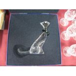 A Swarovski Crystal Symbols Cat, with green collar, designed by Adi Stocker, 12cm high (boxed).