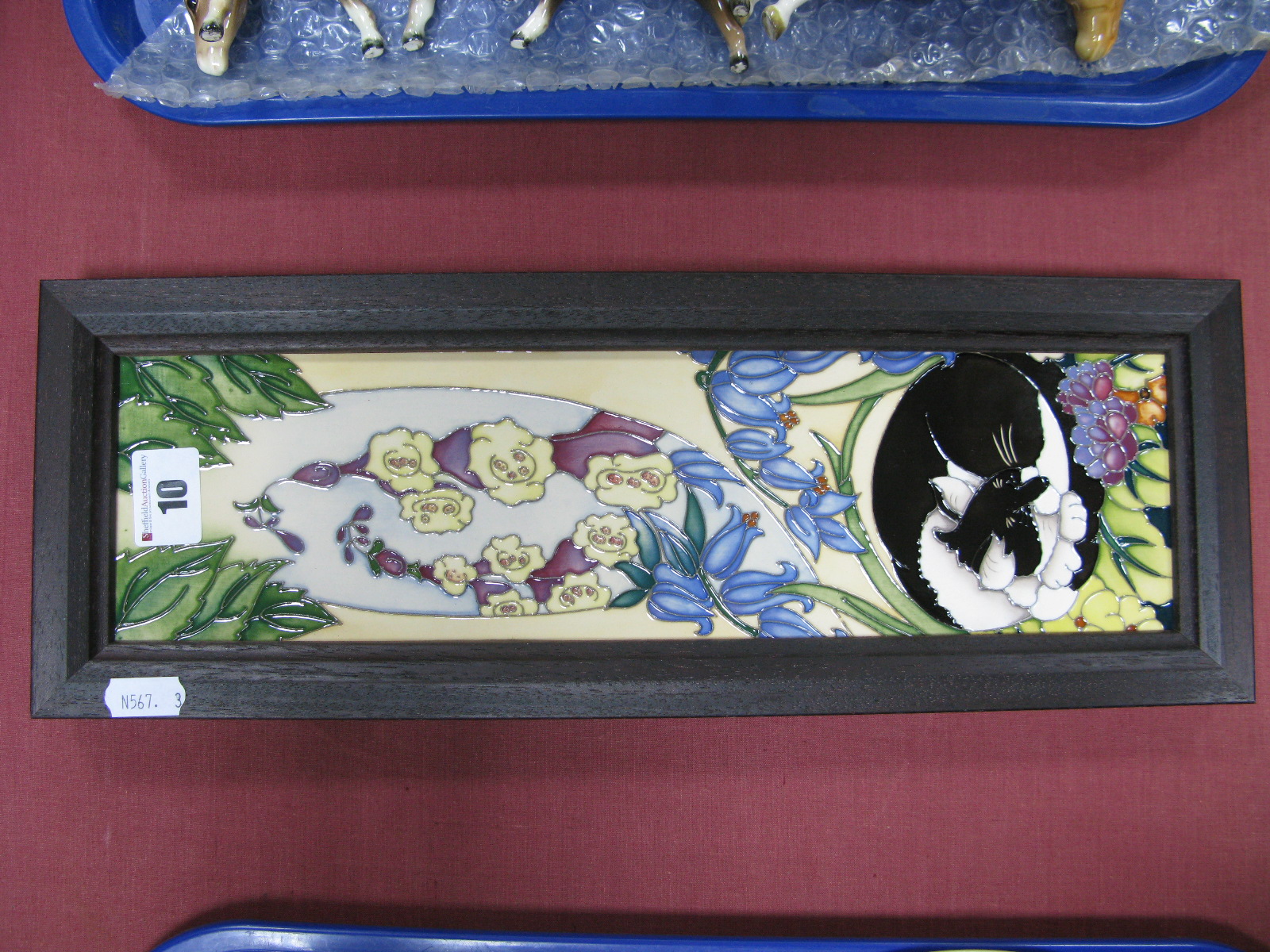 A Moorcroft Pottery Plaque 'Black Catnap', numbered edition 146, designed by Rachel Bishop, 34 x