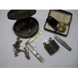 A Rotary Gent's Wristwatch, folding fruit knife, guard/muff chain, further knife, lighter, money