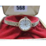 Bentima; A 9ct Gold Cased Ladies Wristwatch, the signed dial with line markers, within plain case,