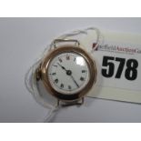 A 9ct Gold Cased Ladies Wristwatch Head, (no strap) (winder at 9) with black and red Roman numerals,