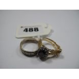 A 9ct Gold Eternity Band; a cluster ring stamped "18ct" and a single stone ring. (3)