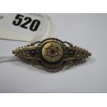 A 15ct Gold Victorian Bar Brooch, of foliate design, with seed pearl highlights, within rope twist