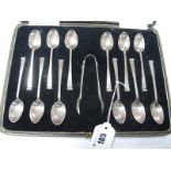 A Set of Twelve Hallmarked Silver Tea Spoons, of Art Deco style; together with pair of matched sugar
