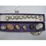 A Shell Carved Cameo Bracelet, with marcasite set highlights, cameo brooches, one depicting a rose.