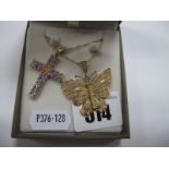 A QVC 9ct Gold Cross Pendant, with claw set highlights, on fine chain, a 9ct gold butterfly pendant,