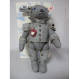 A Modern Steiff Jointed Teddy Bear Tin Man,#682940 'The Wizard of Oz', grey, 30cm high, heart shaped