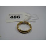 A Plain Wedding Band, indistinctly stamped "22".