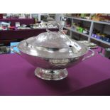 A Large Plated Twin Handled Lidded Tureen, of oval form, with foliate and leaf scroll decoration,