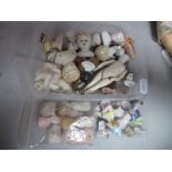 A Quantity of Small Porcelain Dolls Heads, Snowbabies etc.