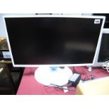 A Samsung 24" Flatscreen T24D391 HDTV Monitor, white surround.