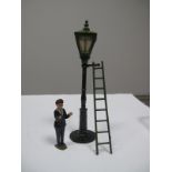 A Lead Street Gas Lamp and Cleaner with Ladder by John Hill & Co, overall good.