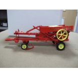 A Boxed G and M Originals Diecast Model Agriculture Jones Bailer, some damage.