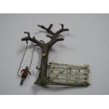 Pre-War Britains Lead Garden No. 19, tree and gate with boy on swing, missing swing seat.