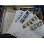 A Collection of Over 140 First Day Covers (1970's - 80's) GB and World stamps, un circulated coin