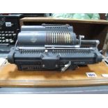 A 'Guy's' Muldivo 'Britannic' Calculating Machine, number 2BT/T 12044, in mahogany case.