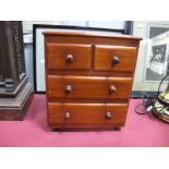 A XIX Century Mahogany Apprentice Piece Chest, of two short and two long drawers, having turned