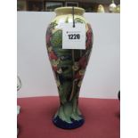 A Moorcroft Pottery Vase, decorated with the (Trial) "Ferns and Foxglove" pattern, designed by