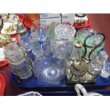 A XIX Century Claret Jug, four bottle condiment, XIX Century cranberry glass jug, etc:- One Tray