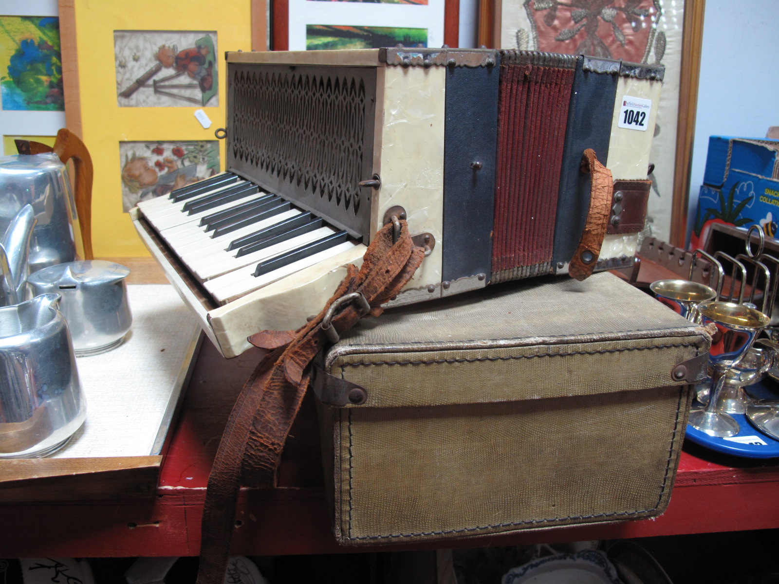 A Viking Brass Trumpet, cased and a Ludwig accordion. (2)