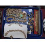 A Collection of Vintage Gilt Costume Jewellery, including necklaces, bracelets and rings:- One Tray