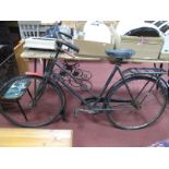 A Mid XX Century Black Painted Bike, having Brooks saddle.