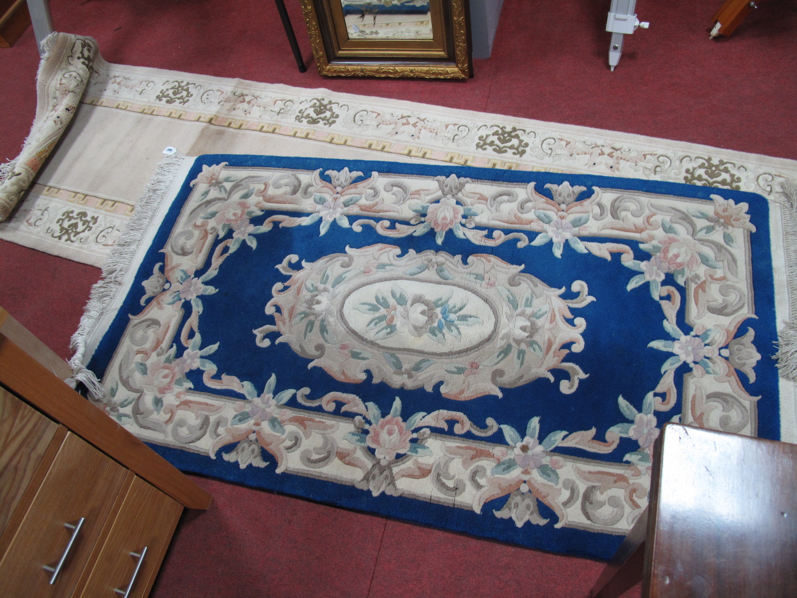 Chinese Wool Tasselled Rug, with floral oval central motif and border, 152 x 91cm; Chinese wool