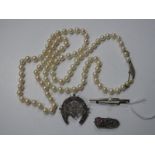 A Single Strand Uniform Pearl Bead Necklace, to pierced clasp stamped "9ct"; a hallmarked silver