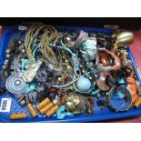 A Mixed Lot of Assorted Ethnic Style Costume Jewellery, necklaces, bracelets and bangles etc:- One