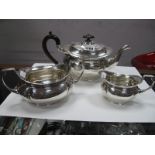 A Three Piece Plated Tea Set, each of shaped design with ribbon and reed border. (3)
