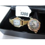 A 9ct Gold Cased Ladies Wristwatch, the shell inset dial with Arabic numerals, within plain case, on