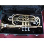 A Brass Earlham Cornet, in a hard case; a chrome 'Kosikup C' mouthpiece.