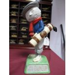 A Modern Reproduction of The 'We Play Dunlop' Golf Advertising Figure, 40cm high.