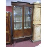 An Edwardian Inlaid Mahogany Display Cabinet, with astragel doors, two internal shelves on