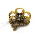 A Sweetheart Locket Back Brooch, of openwork textured design, collet set cluster to the centre (