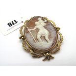 A Large 9ct Gold Oval Shell Carved Cameo Brooch/Pendant, depicting St Christopher, collet set within