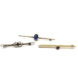 A Single Stone Bar Brooch, oval collet rubover set, on plain long bar; A Single Stone Bar Brooch,