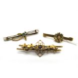 An Openwork Bar Brooch, inset to the centre, with stylised lead applied detail, stamped "9ct"; A 9ct