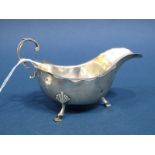 A Hallmarked Silver Sauce Boat, WB Ltd, Birmingham 1942, with wavy cut edge and leaf capped flying