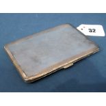 A Slim Hallmarked Silver Cigarette Case, WNLtd, Birmingham 1937, of rectangular form, allover engine