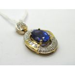 A Modern AAA Tanzanite and Diamond Set Pendant, oval four claw set to the centre, within border of