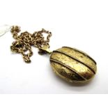 A 9ct Gold Oval Locket Pendant, of Victorian style, on a 9ct gold chain.