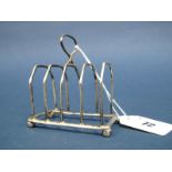 A Small Hallmarked Silver Five Bar Toast Rack, Mappin & Webb, Birmingham 1908, with central loop