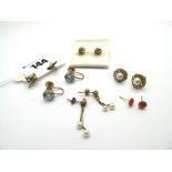 A Pair of Single Stone Earrings, claw set (unpierced screw fittings); A Pair of Modern Ruby and