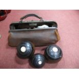 Pair of Lawn Green Bowls, by Peter B Cardman of Bolton, a similar jack, a leather Gladstone bag.