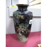 Oriental, Cloisonne ovoid vase featuring exotic birds amongst foliage on black ground, with fine