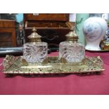 T & Co XIX Century Brass Desk Top Inkstand, with two glass inkwells, on a pierced glass tray.