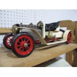 A Mamod SA1 Live Steam ''Steam Roadster.'' Cream, Red Wheels, with Water Sight Glass to Boiler,