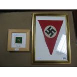 A German Third Reich Cloth Pennant, framed and Third Reich tie pin, framed.